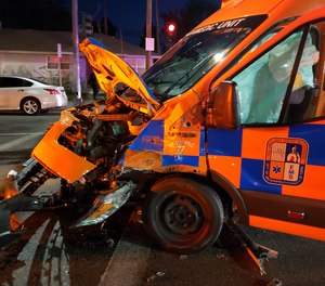 A Hall Ambulance Service crew is being lauded for their patient care actions after their rig was struck by another vehicle on Saturday.