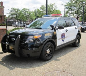 The Canton Police Department is searching for a man suspected of shooting at an ambulance two other vehicles during a domestic dispute.
