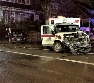 Portland police say an intoxicated driver struck an American Medical Response ambulance early Saturday morning. The crash left three injured.