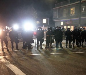 Portland Police declared a riot Tuesday, June 30, 2020, as protesters gathered outside Portland Police Union headquarters on North Lombard Street.