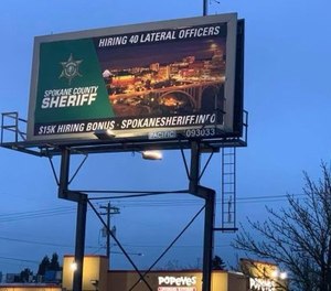 This April 4, 2021, photo shows one of a handful of billboards that was up in Portland advertising Spokane County Sheriff's Office's $15K hiring bonus for mid-career officers.