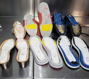 CBP officers at Atlanta airport find 3 pounds of cocaine in these shoes.