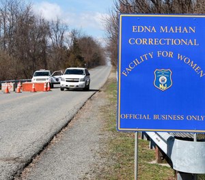A coalition of activists, religious leaders and former inmates gather outside Edna Mahan Correctional Facility for Women in Clinton to protest abuse behind bars. Many of the bills passed by the panel were directed at the facility, which is likely to soon come under federal oversight.