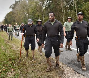 Jacksonville Sheriff's Office police and Fish and Wildlife officers search for missing siblings Braxton and Bri'ya Williams along U.S. 90 after they went missing on Dec. 17, 2019.