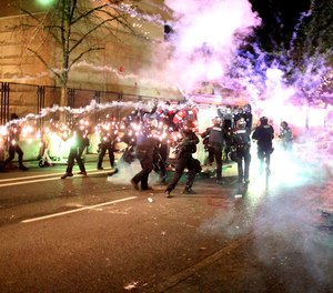 Portland police officers began concealing their names and badge numbers in June 2020 while responding to protests, citing worries over officers’ privacy and safety.