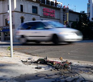 A man drove into a group of protesters, killing one woman and injuring others at an Uptown Minneapolis intersection late Sunday. The scene as it looked Monday.