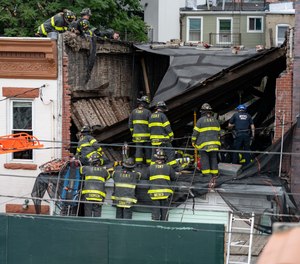 “A brick wall had collapsed onto workers on the second floor and brought the roof down on top of them, pinning them between the roof, the brick wall and the floor,” said FDNY Deputy Assistant Chief Joseph Ferrante.