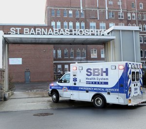 Daniel Corby, 26, was being transported by two EMTs to St. Barnabas Hospital when he went berserk about 4 a.m., authorities said. Corby allegedly unbuckled himself, pulled a knife and threatened the hardworking first responders.