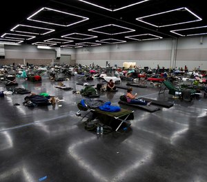 People made use of a cooling center at the Oregon Convention Center during Portland's unprecedented heat wave on Monday, June 28, 2021.