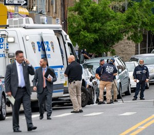 As his son lay dying after shooting at off-duty NYPD officers, his father grabbed the gun and began firing.
