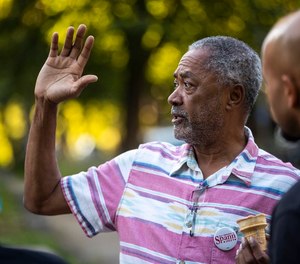 Former City Council Member Don Samuels, seen at a neighborhood event on Aug. 12, is one of three Minneapolis residents behind the lawsuit.