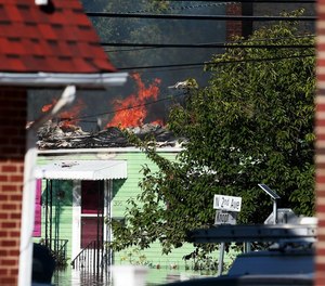 The fires in Manville started on Thursday afternoon when Raritan River flooding still blocked many of roads in town.