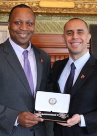 Michael Stevens, left, was promoted to recreation director by Mayor Jorge O. Elorza in 2015, above. Now Stephens will be promoted to the Providence Police Department as a civilian major responsible for community relations and diversion.