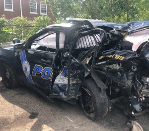 An Akron police cruiser was struck by a Hyundai Sonata. Four officers and the driver of the Sonata were injured.
