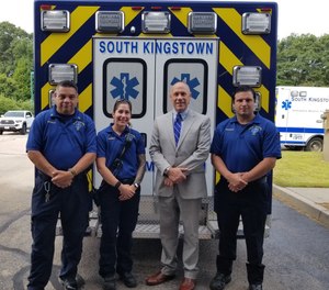 State police Col. James Manni, with South Kingstown EMS Capt. Frank Capaldi and Paramedic Sarah Peet to his left. Paramedic Keith DeCesare is to his right.