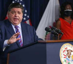 Under Gov. J.B. Pritzker's latest order, first doses must be received by Oct. 14; Friday’s executive order marks the second time Pritzker has delayed a deadline for a vaccine mandate.