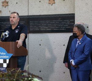 Chicago FOP President John Catanzara and Mayor Lori Lightfoot.