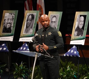 Broward Sheriff Gregory Tony speaks at a memorial service on Nov. 9, 2021, for nine BSO employees who died from COVID-19.