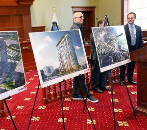 Quincy Mayor Thomas Koch and developers Joey Arcari and Sam Slater on Thursday announced three new large buildings on Hancock Street.