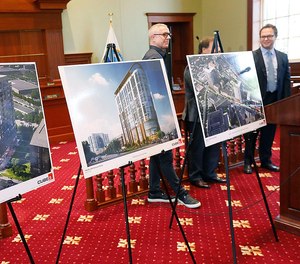 Quincy Mayor Thomas Koch and developers Joey Arcari and Sam Slater on Thursday announced three new large buildings on Hancock Street.