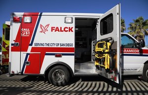 A new Falck ambulance was displayed on Oct. 13, 2021. City Council members said Wednesday they're ready to sue if Falck doesn't soften its financial demands in negotiations over a new model that would shift authority over billing and ambulance staffing from Falck to the city.