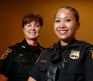 Edison Police Officers Lisa Cimmino (left) and Shirley Dong at the police station in Edison, N.J. August, 10, 2021