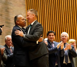 Commissioner Dermot Shea, right, embraces First Deputy Commissioner Benjamin Tucker at NYPD Headquarters on Dec. 2, 2019 in Manhattan.