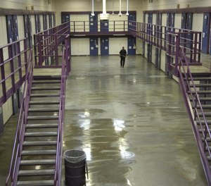 A corrections officer checks a cellblock at North Branch Correctional Institution outside Cumberland in 2007.