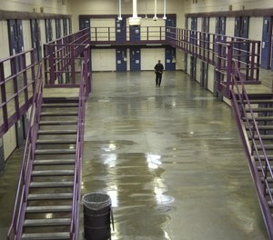 A corrections officer checks a cellblock at North Branch Correctional Institution outside Cumberland in 2007.