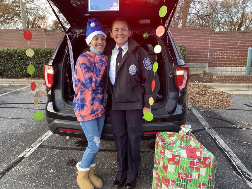 Gastonia (N.C.) Police Assistant Chief Nancy Brogdon participates in buying gifts for the fifth-graders of the Boys and Girls Clubs of Gaston at Shop with a Cop.