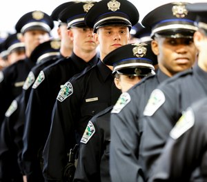 Austin police cadets participate in a commencement exercise in May 2019. A new study says that the Austin Police Department's patrol ranks should be increased by at least 108 officers.