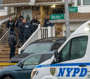 An ex-con shot an NYPD narcotics detective in the leg during a wild pre-dawn gunfight as police raided a suspected drug operation inside his home on Thursday, Jan. 20, 2022, in New York City.