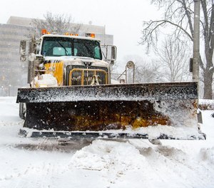 A plow truck pushes snow after a massive nor'easter hit New Jersey and other areas of the northeast on Saturday, January 29, 2021.