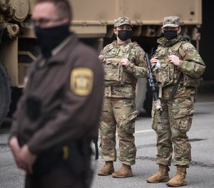 Minnesota National Guard soldiers, seen here during the trial of former officer Derek Chauvin, could be deployed in St. Paul during the federal civil rights trial of three other former officers.