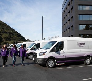 Team members for San Diego County's Mobile Crisis Response Team (MCRT) show off their new fleet of specially adapted vans. MCRT dispatches behavioral health teams that can respond to mental health and substance use emergencies instead of police.