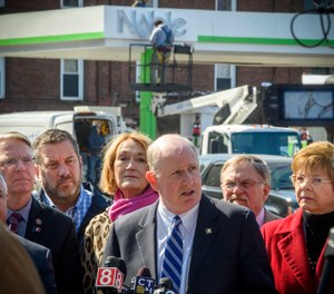 Senate GOP leader Kevin Kelly is joined by House and Senate Republicans during a press conference in Minuteman Park calling for gasoline tax cuts.