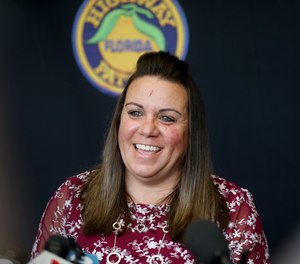 Florida Highway Patrol trooper Toni Schuck talks with the media on Thursday, March 10, 2022, she potentially saved lives Sunday by crashing her cruiser into a DUI suspect barreling towards a road race.