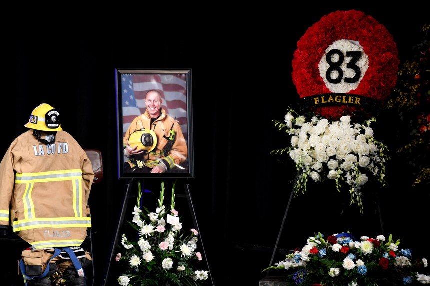 Family, friends, and firefighters gathered at a memorial service for Los Angeles County firefighter Jonathan Flagler, who died battling a house fire in Rancho Palos Verdes on Jan. 6. The service was held at Cottonwood Church in Los Alamitos on Friday, Jan. 21, 2022.