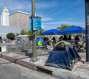 A homeless encampment in Toriumi Plaza at 1st St and Judge John Aiso St in Los Angeles Thursday, March 17, 2022.