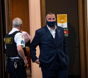 Chicago FOP President John Catanzara exits a hearing at Cook County Circuit Court Oct. 28, 2021, on an FOP motion to halt implementation of Mayor Lightfoot's vaccine mandate.