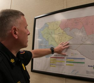 Winslow Township Fire Chief Marc Rigberg shows a map of the 60 square miles the department covers at Cedar Brook Volunteer Fire Company in Sicklerville. After 97 years, the fire station halted emergency operations in mid-April due to low staff numbers.