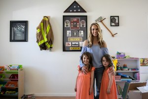 Caylie Valenta poses for a portrait with her daughters Lilly, 5, and Grace, 3, at their home on April 18.
