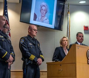 Sacramento District Attorney Anne Marie Schubert talks about a 34-year-old cold case at the Galt Police Department on Tuesday. Lucille Hultgren, visible in the photo above Schubert, was killed in 1988.