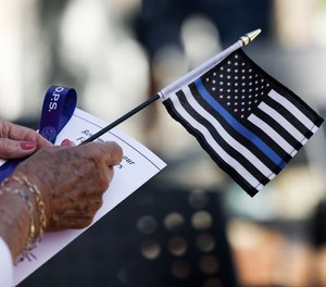 Mini thin blue line flags at Springfield Police Department's annual Memorial Ceremony on Wednesday, May 18, 2022.