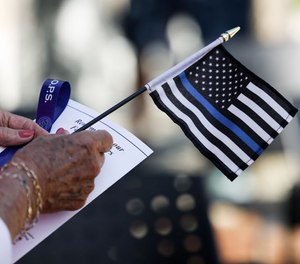 Mini thin blue line flags at Springfield Police Department's annual Memorial Ceremony on Wednesday, May 18, 2022.