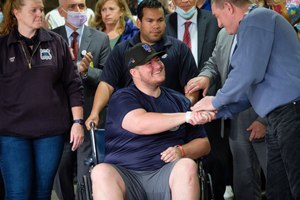 EMT Richard McMahon, who was shot by a patient on Wednesday, greeted supporters as he was released from Richmond University Medical Center in Staten Island on Thursday.
