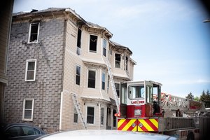 Four people died on May 14 in a four-alarm fire at 2 Gage St. in Worcester, Mass.