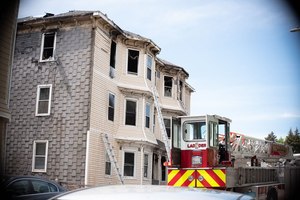 Four people died on May 14 in a four-alarm fire at 2 Gage St. in Worcester, Mass.
