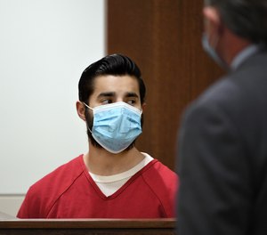 Steven Carrillo, 32, listens to court proceedings during a hearing in Dublin, Calif., on Thursday, Aug. 27, 2020.