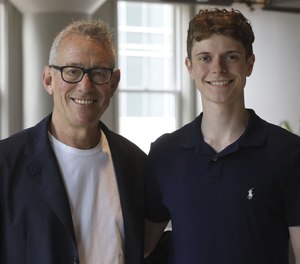Steve Levin (left) and the man who saved his life using CPR, Dylan Gainer, were at the law offices of Levin & Perconti in Chicago on May 31. Levin is paying for Gainer’s further education. Gainer is considering a career in medicine after he completes his undergraduate education.